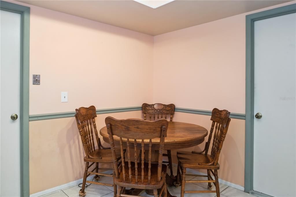 breakfast nook (laundry room door to left, bonus room door to right)