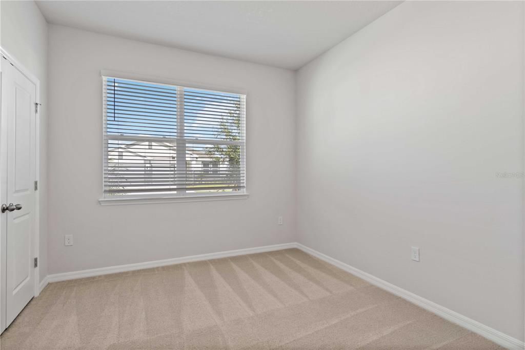 Front Bedroom (#2/4) overlooking the street.