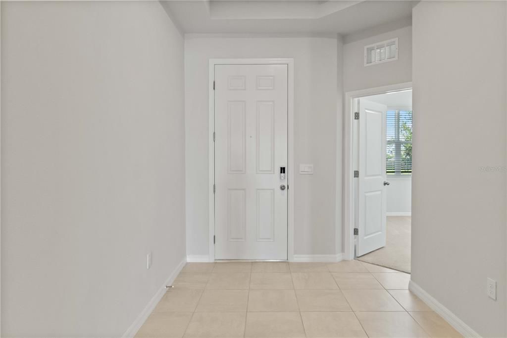 Large, Bright Entryway with Hallway to Jack and Jill Bedrooms