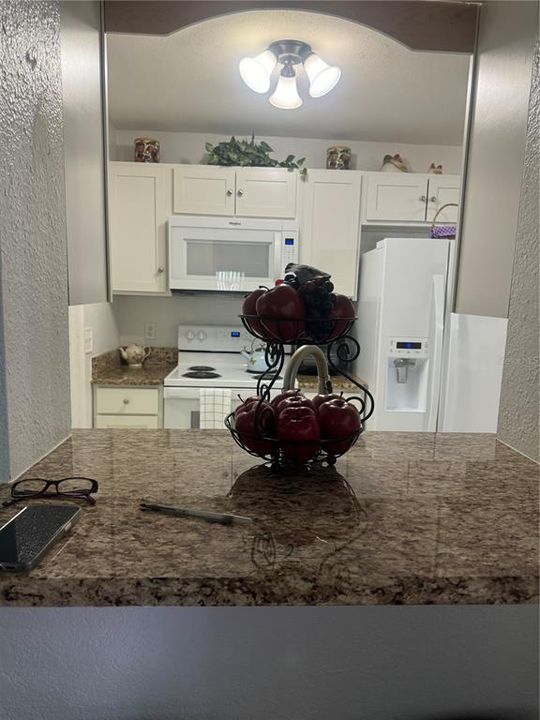 Kitchen overlooking family room