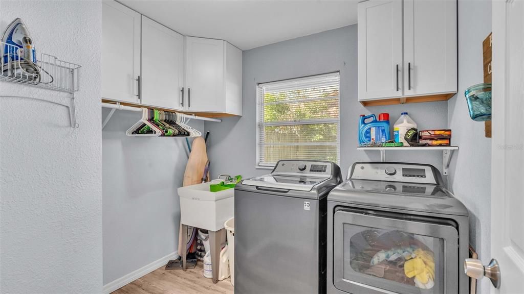 Laundry Room with sink and tons of cabinets