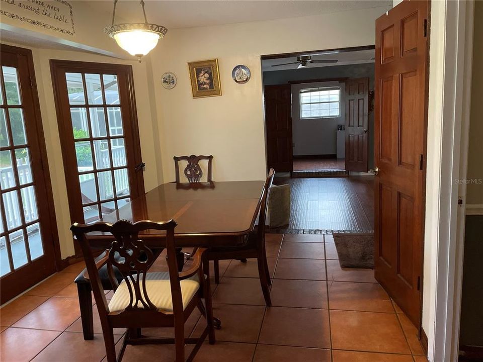 dining area, looking into liv area. door to understairs storage closet