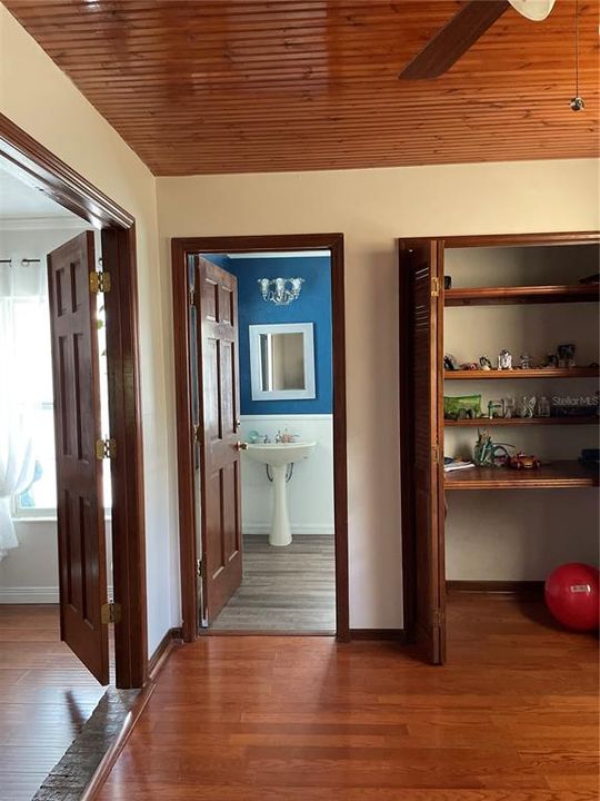 Bonus room off of the living area with a half bath.