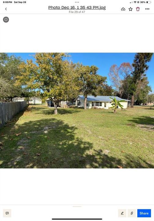 Right side of home behind carport