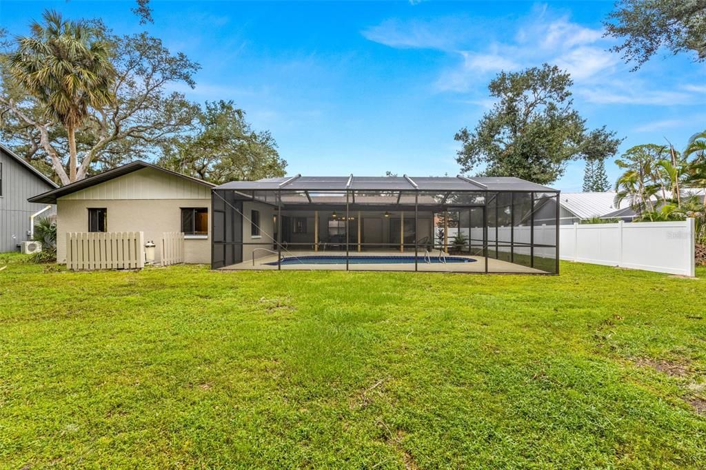 Large partially fenced backyard for privacy