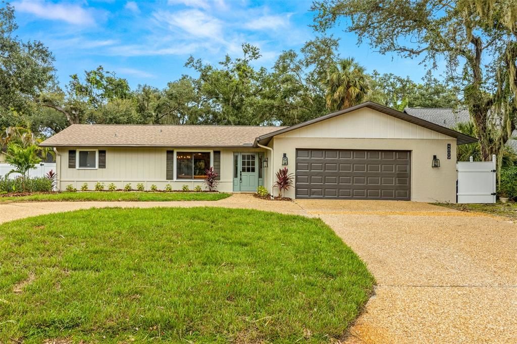 Front exterior w/ circular driveway