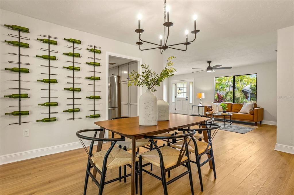 Formal dining room with wine wall display