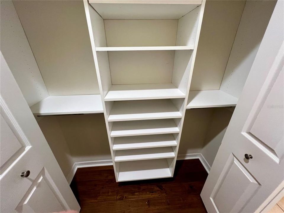 Linen closet in master bath hall custom design