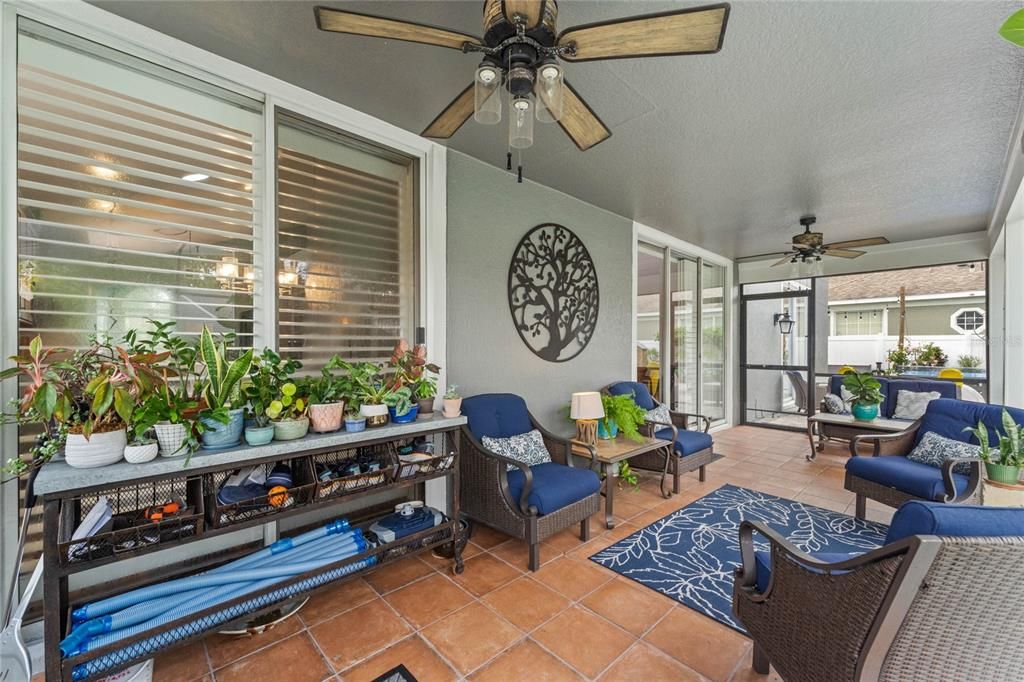 View of the rear screend patio toward the home.