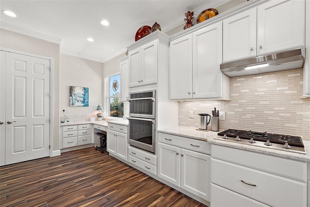 This super light and bright kitchen is adorned with natural light and is the heart of the home.