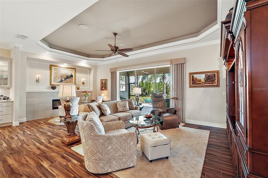 Wood look walnut color tile adds to the warmth of this home and makes for easy cleaning. Built in surround sound is available for your TV hook up.