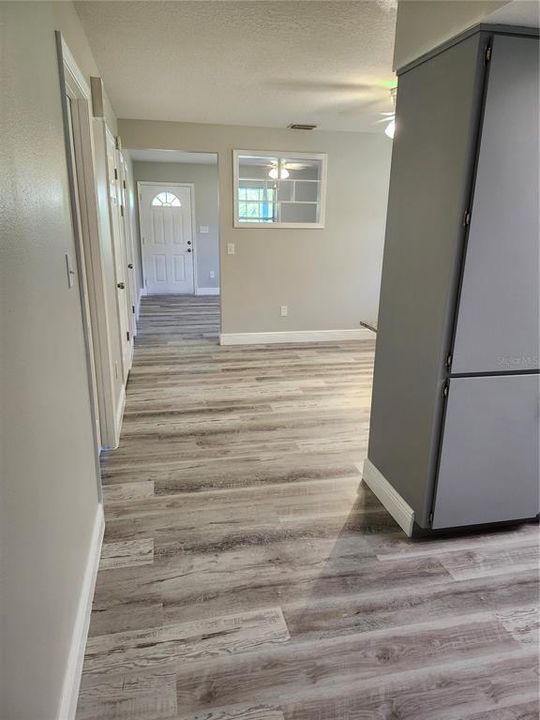 View from kitchen of Dining Room then Living Room