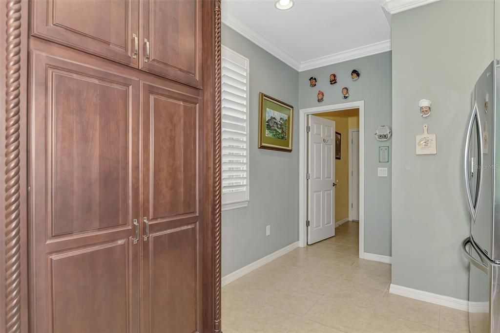 Custom-built pantry with pull-outs.