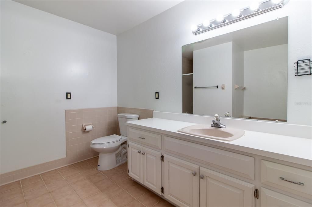 Bathroom area also has generous vanity