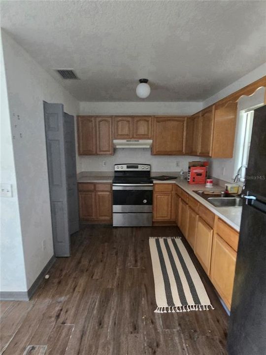 Bedroom 1 with closet and ceiling fan