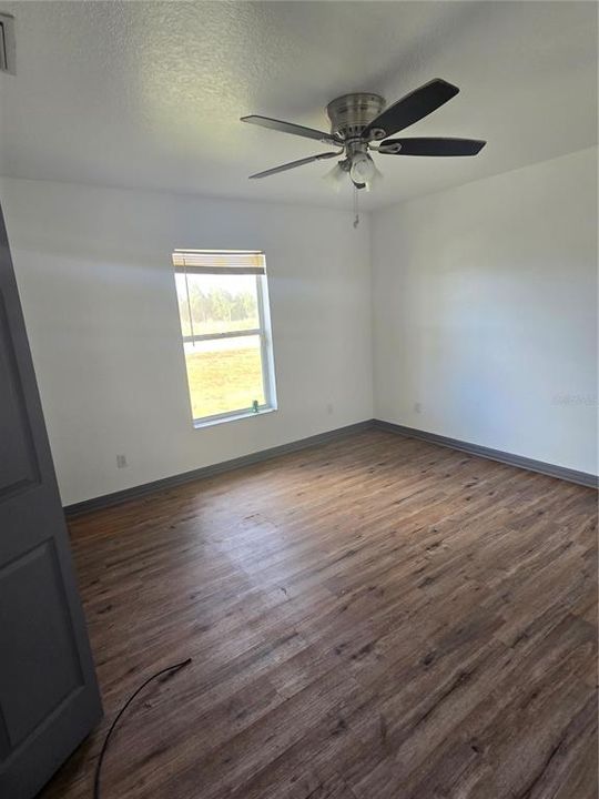 Bedroom 2 with closet and ceiling fan