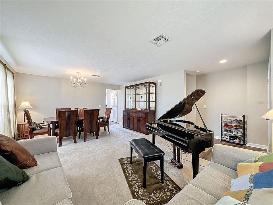 Great room with living room and dining room