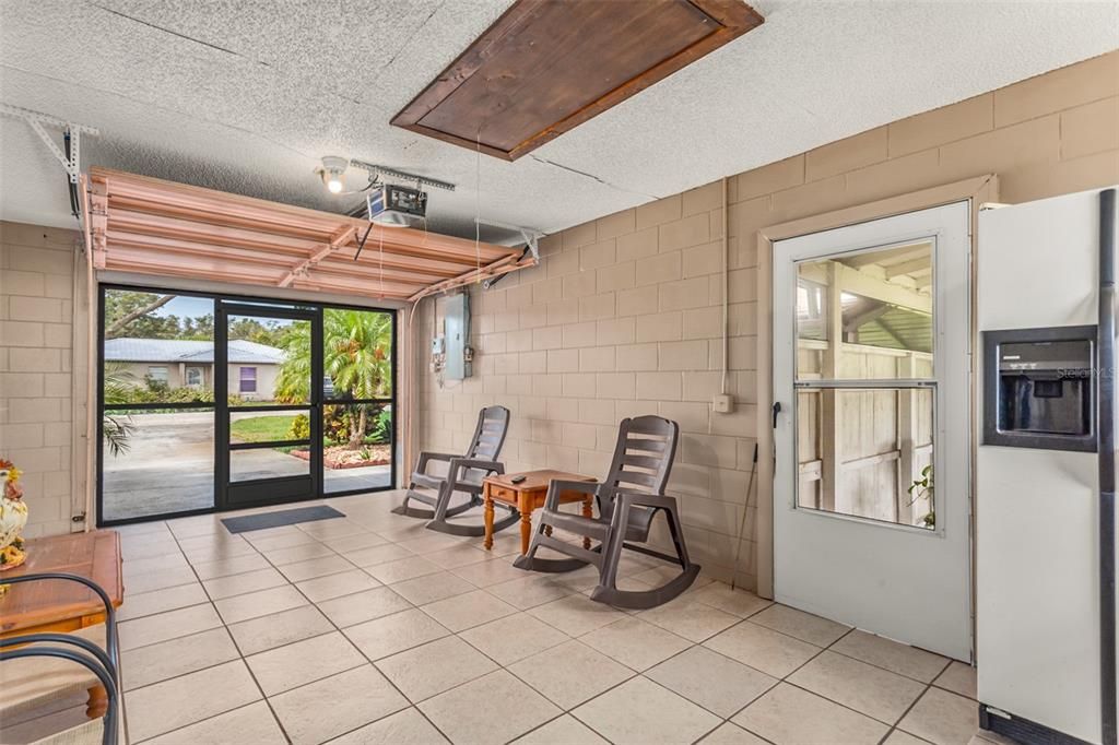 Garage being used as a screen room