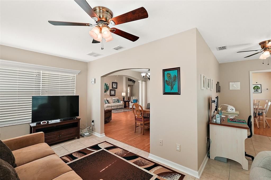 Bonus room has tile and ceiling fans.