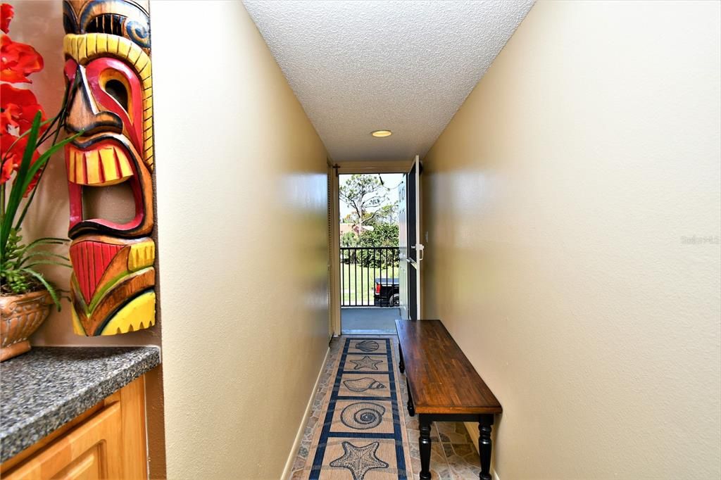 Foyer coming into condo