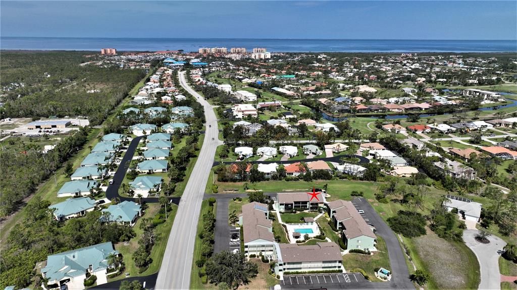 Arial View of Condo with the Marina and Harbor behind.