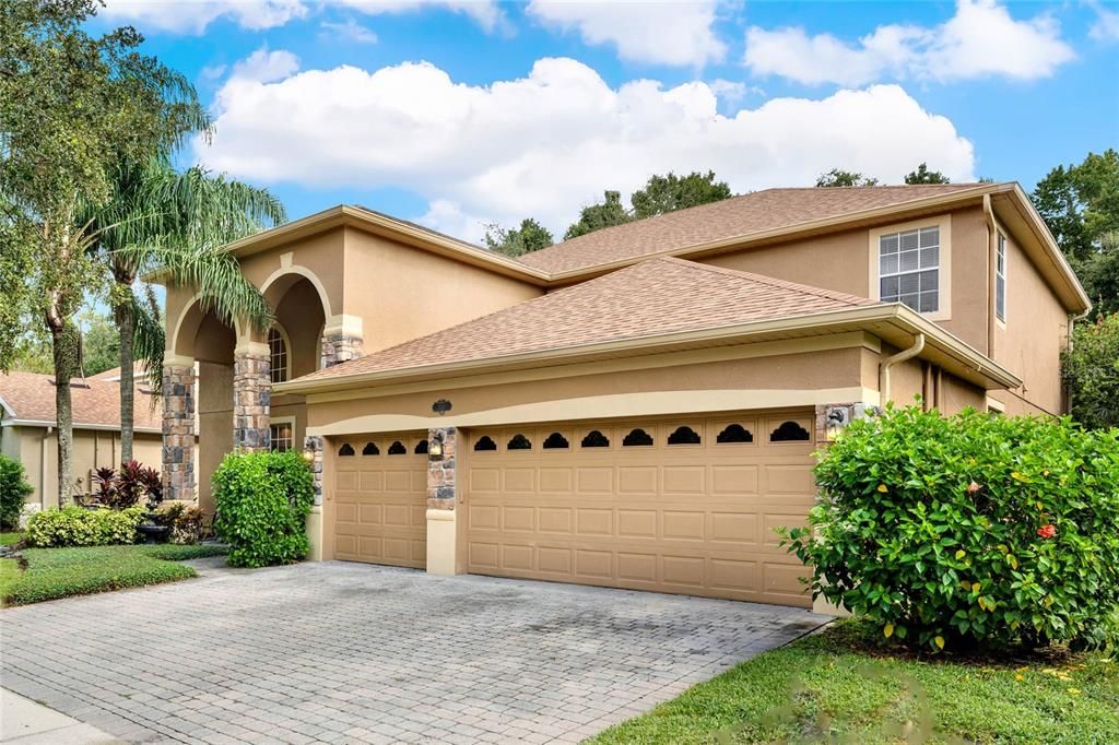 Beautiful Curb Appeal with Three Car Garage