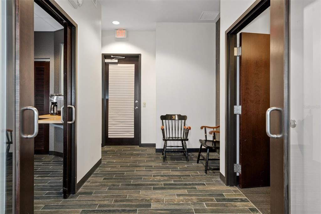 Office space lobby. The door to the right is the private kitchen.