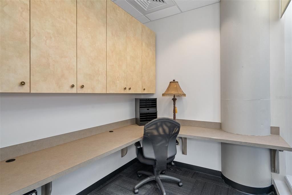 Plenty of work space and storage in the private offices.