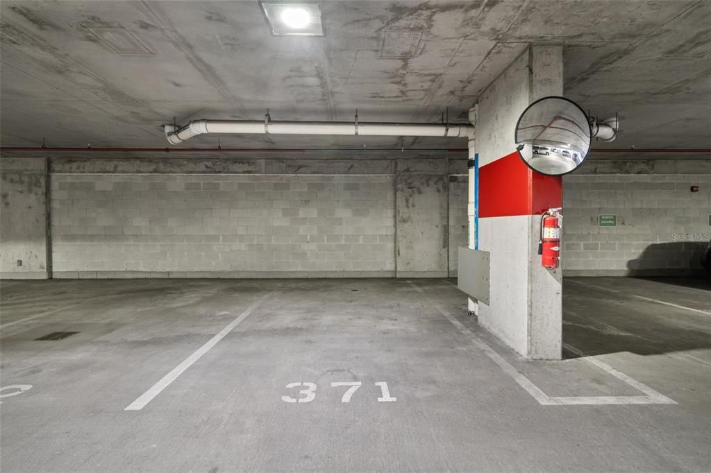 Assigned parking space in gated garage.