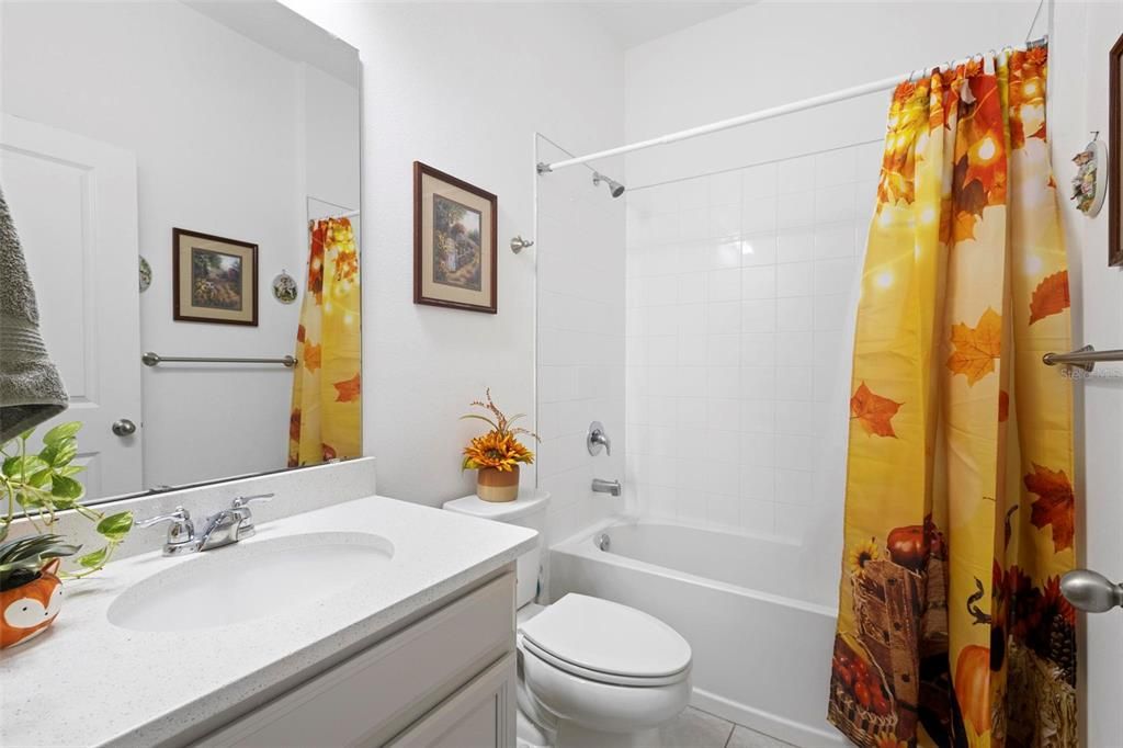 Guest bathroom with shower tub combo