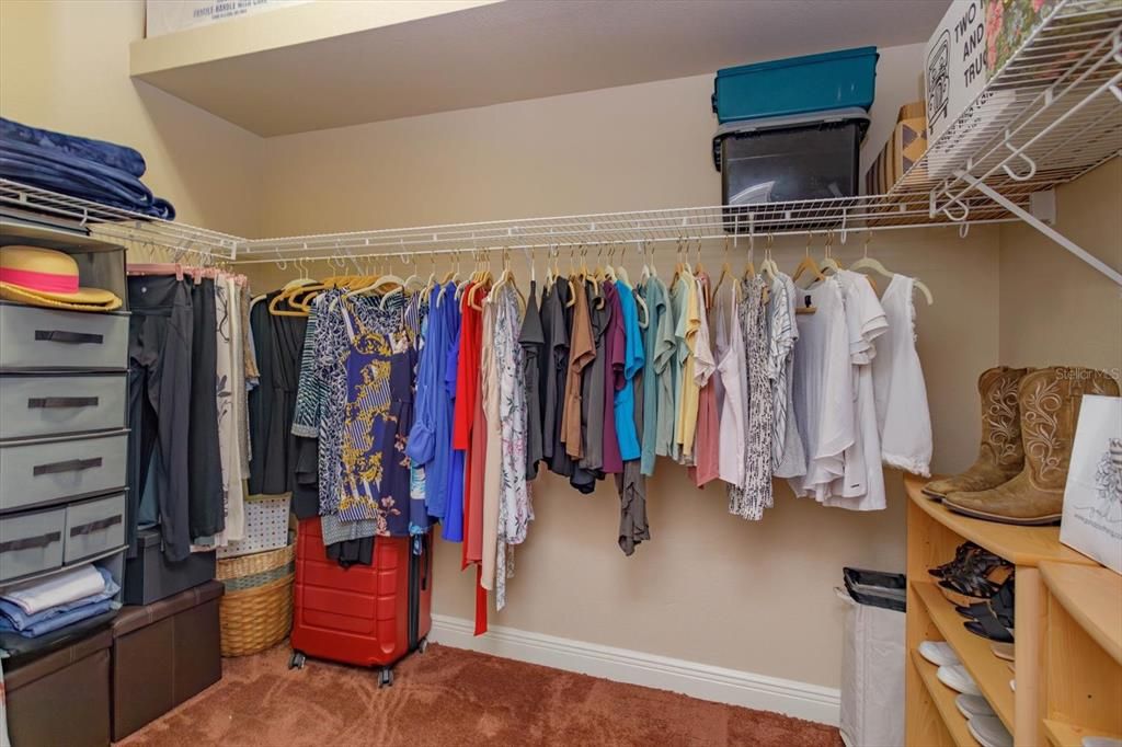 One of two closets in primary bedroom