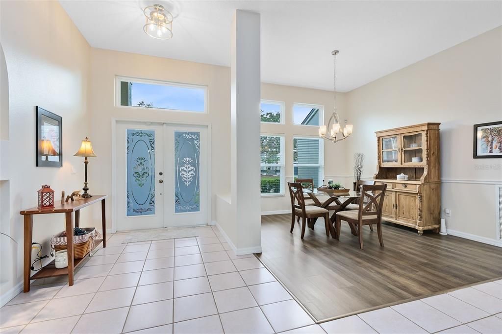 DOUBLE DOOR ENTRY AND DINING ROOM