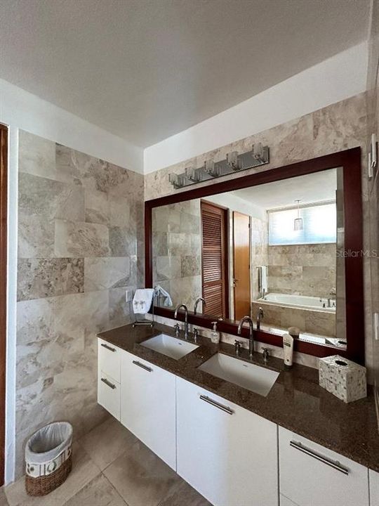 Master bathroom with double sinks.