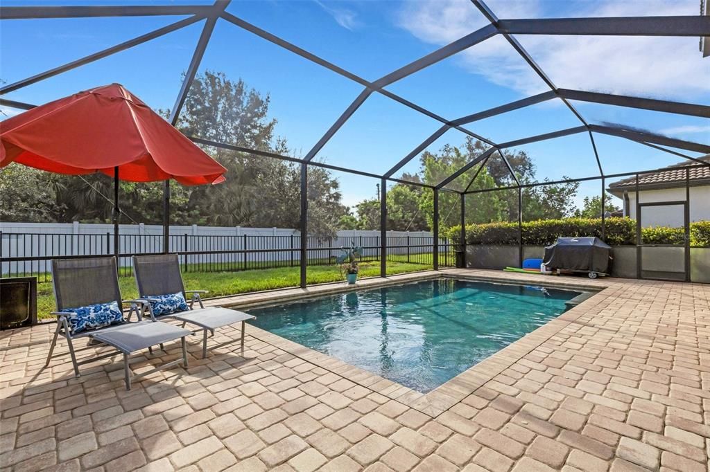 Pool with Pavers and Fenced in Yard Area