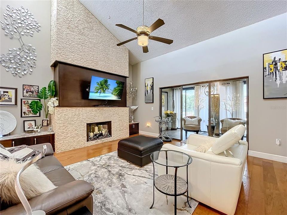 Family room featuring a wood burning fireplace