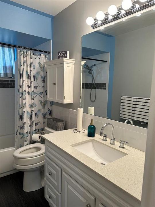 Master bathroom with shower and tub.