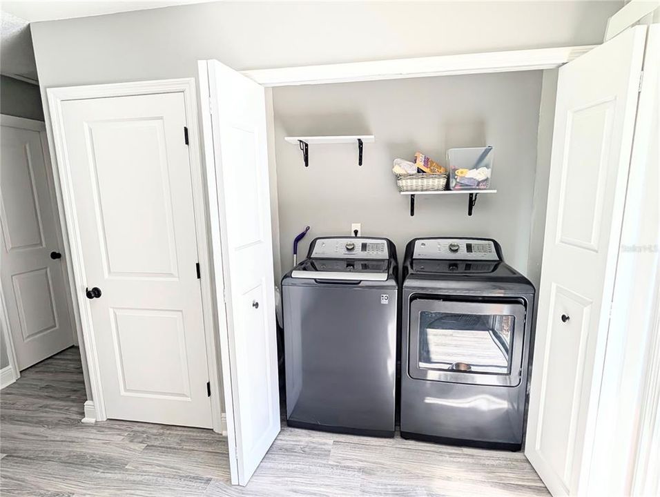 Laundry closet is located in the Kitchen. Washer and Dryer included!