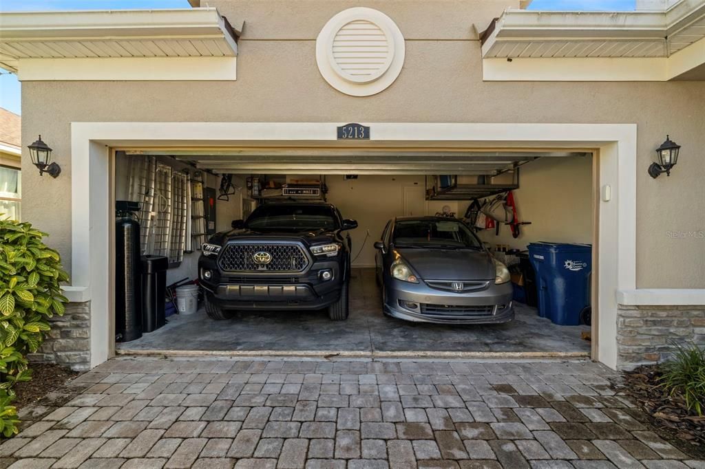 2 Car Garage with above head storage and air conditioned