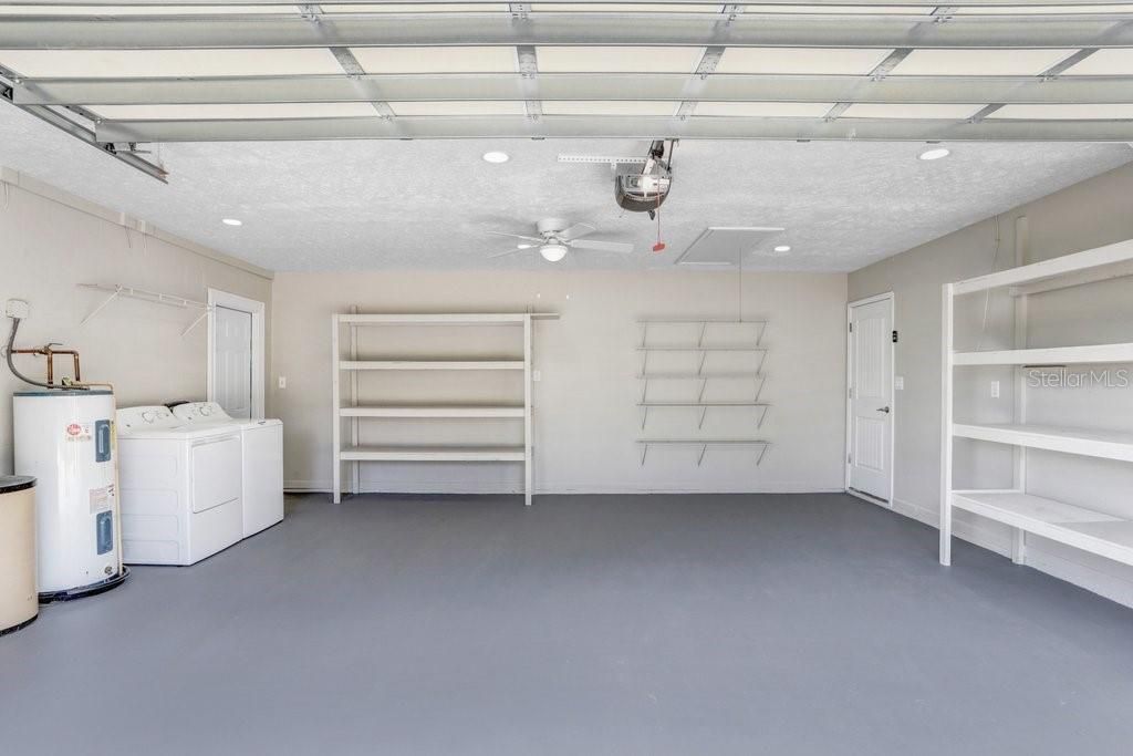 2-car garage with laundry - laundry out in the garage is not a bad thing (noise factor and if any leaks should occur), garage has recess lights and ceiling fan