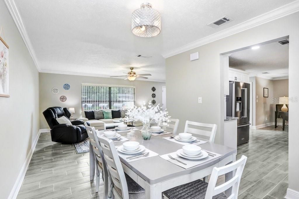 dining room is open to the front living room and to the kitchen