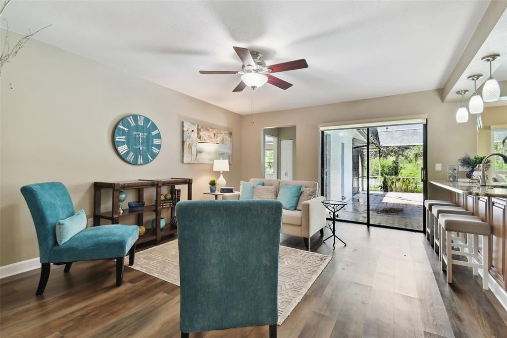 Fabulous open floorplan enhaced by the kitchen/family room combo and easy access to the pool and patio.