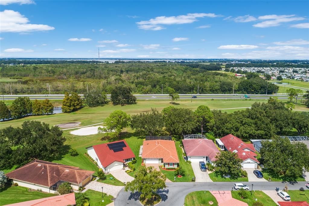 AERIAL VIEW OF HOME OVERLOOKING THE GOLF COURSE