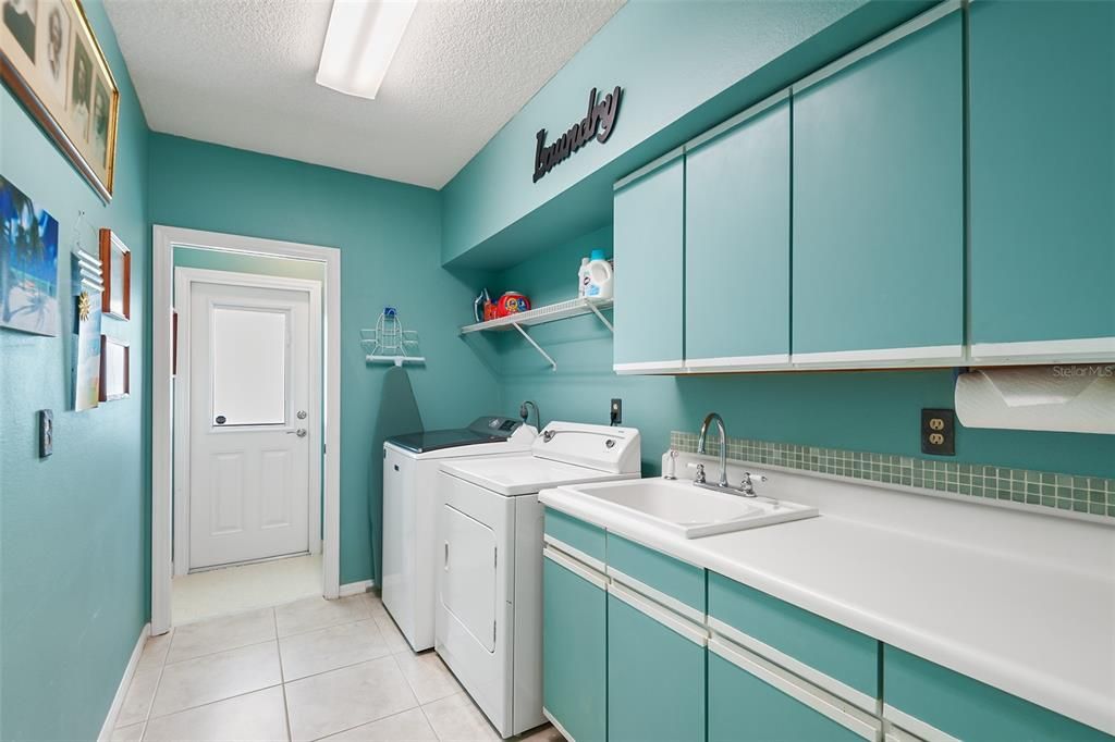 LAUNDRY ROOM WITH HALF BATH AT FAR END