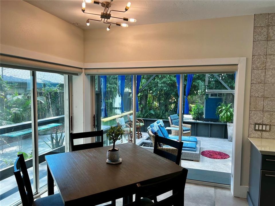 View from Dining Space to outdoor screened lanai