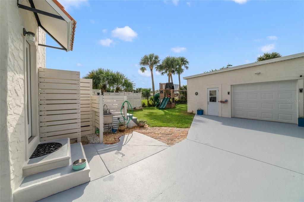 DETACHED GARAGE with tandem parking for two and space above ready to become an IN-LAW/GUEST SUITE for added investment potential!