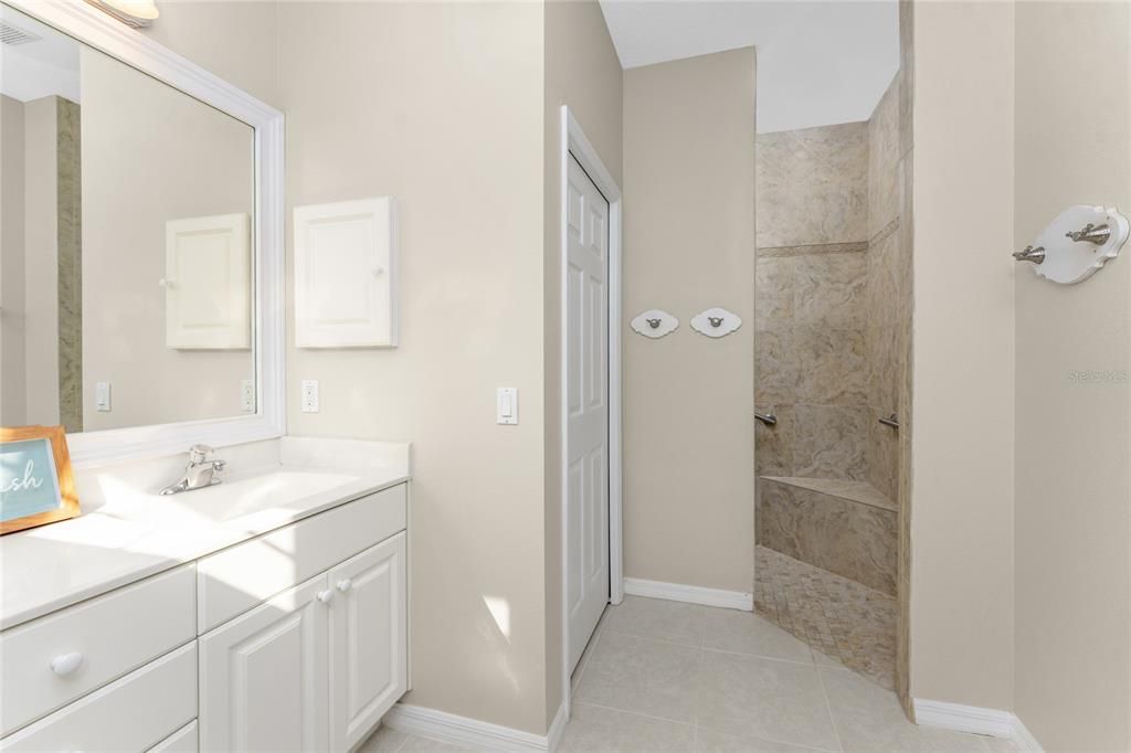 Walk-in shower & private water closet...