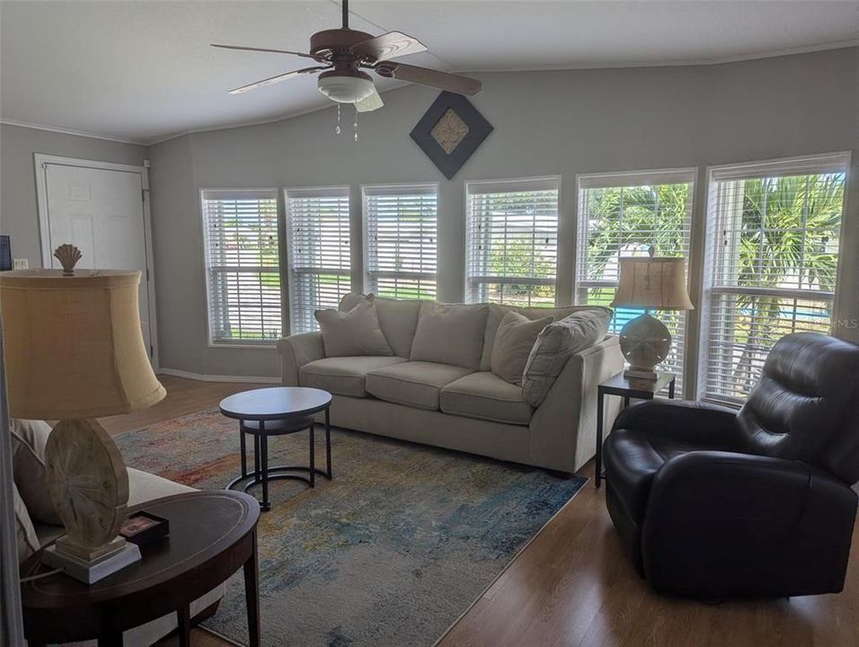 LIVING ROOM FEATURING A LOT OF LIGHT