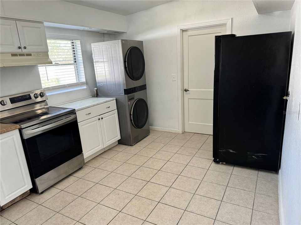 Kitchen showing door to Mother In Law Suite