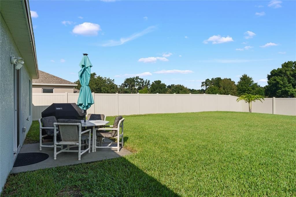 On a large .23 ACRE LOT with a FULLY FENCED BACKYARD.