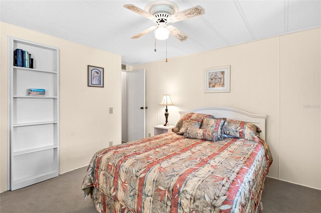 Bedroom features Custom Built-in Shelving